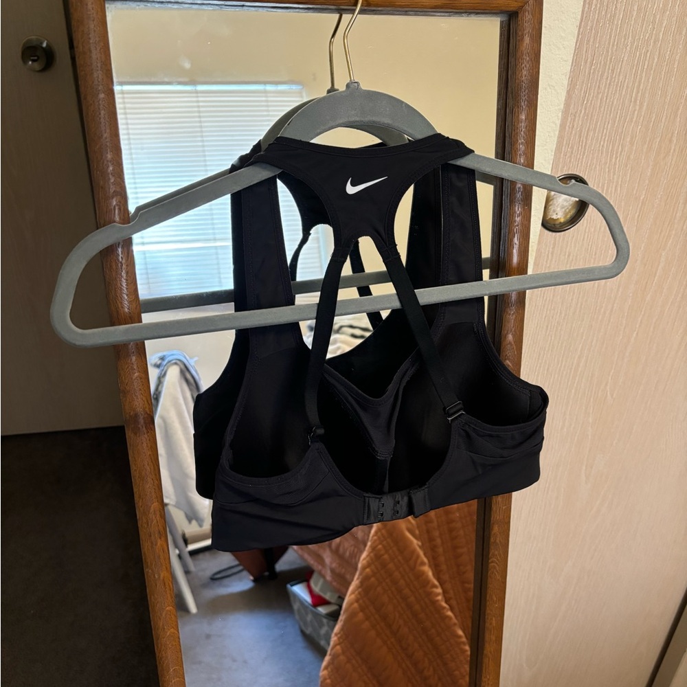 Nike black sports bra, padded cups and adjustable back, size S